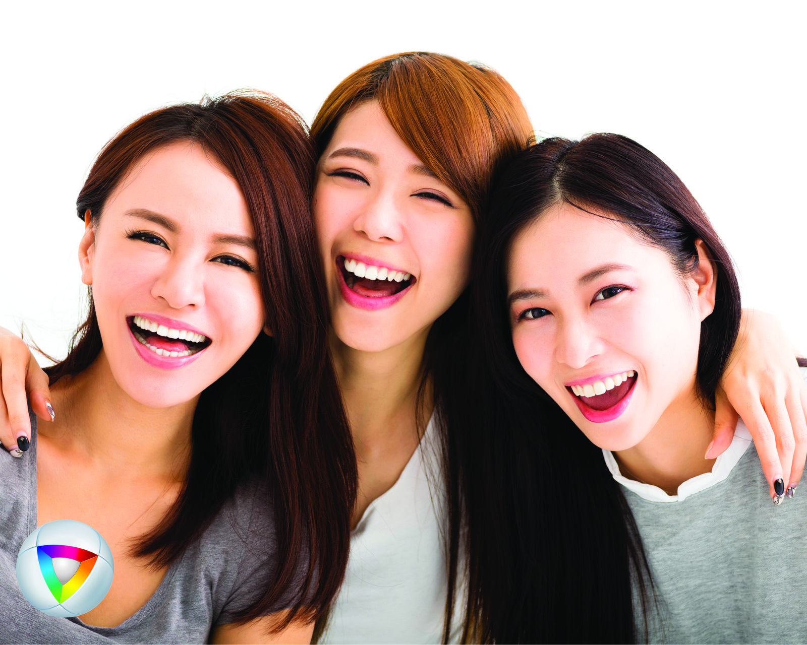 Three women laughing together