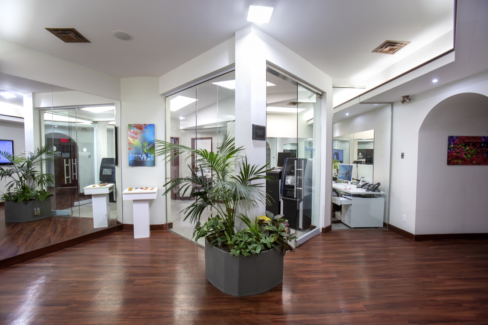The glass-walled in-house laboratory seen from the main corridor of our practice